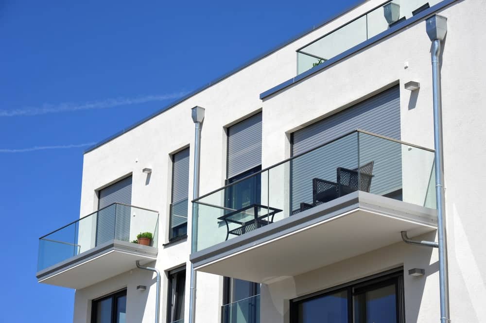 Balcony Rail of high-grade steel and Glass in Front of a House, an example of a good construction material