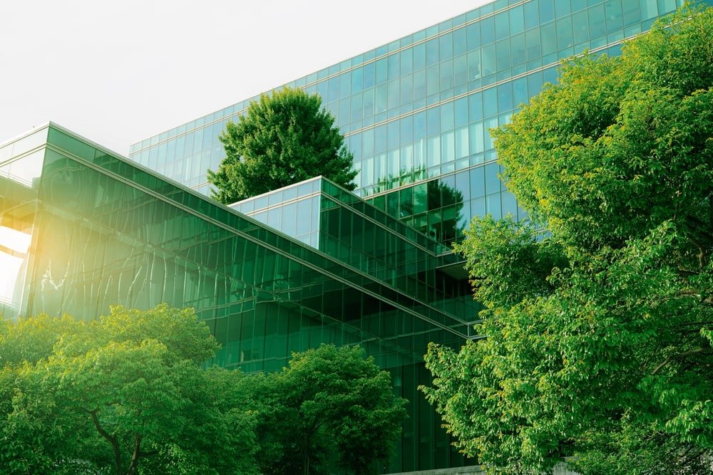 Eco-friendly office building with greenery to reduce CO2, embodying sustainable construction and environmental care. Sustainable Nola Construction concept.